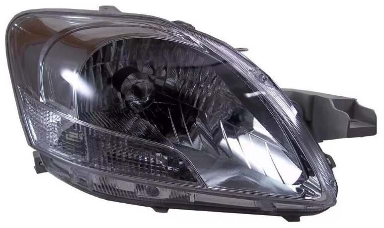 Фара Toyota Belta 05-12 / Yaris 05-13 (Слева/ Галоген/ под электрокорректор/ 4D SED)