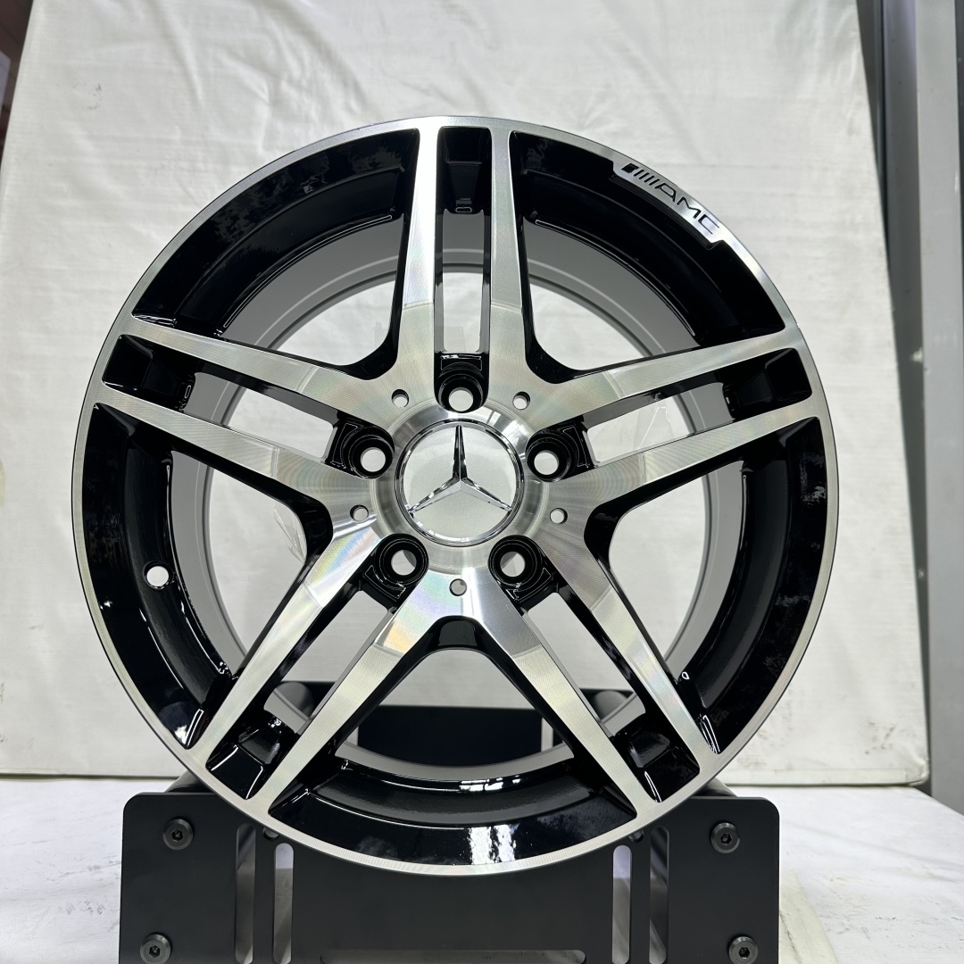 RNO KM704 7x15/5x112 D66.6 ET35 4 диска черный, серебристый
