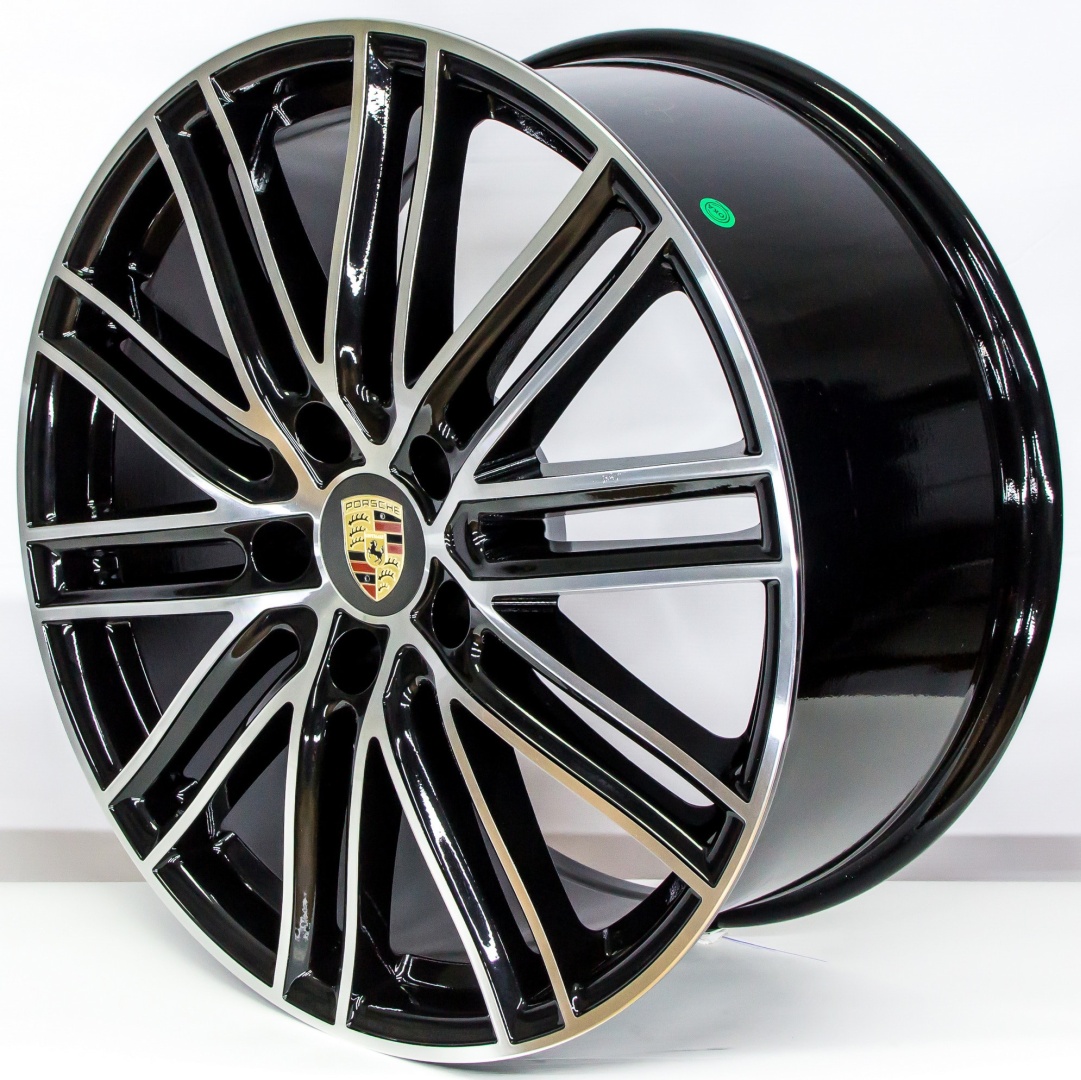 Porsche 887 9.5/11x20/5x130 D71.6 ET63 черный, серебристый