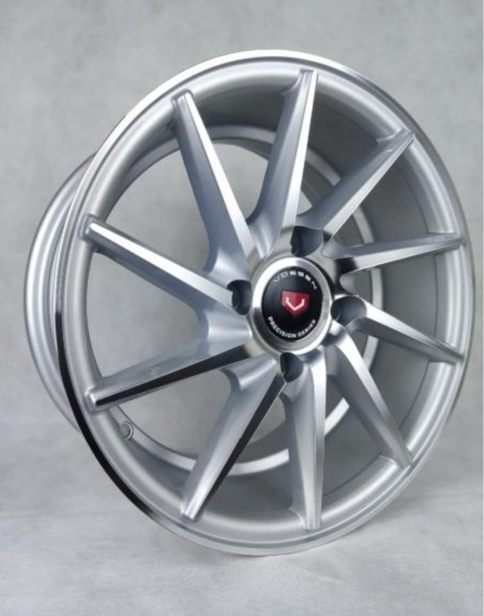 Vossen 077 7x14/4x100 D67.1 ET35 серый