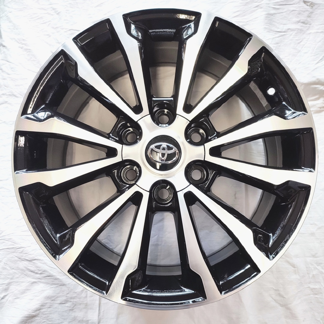 Toyota E203 7.5x18/6x139.7 D106.1 ET25 черный, серебристый