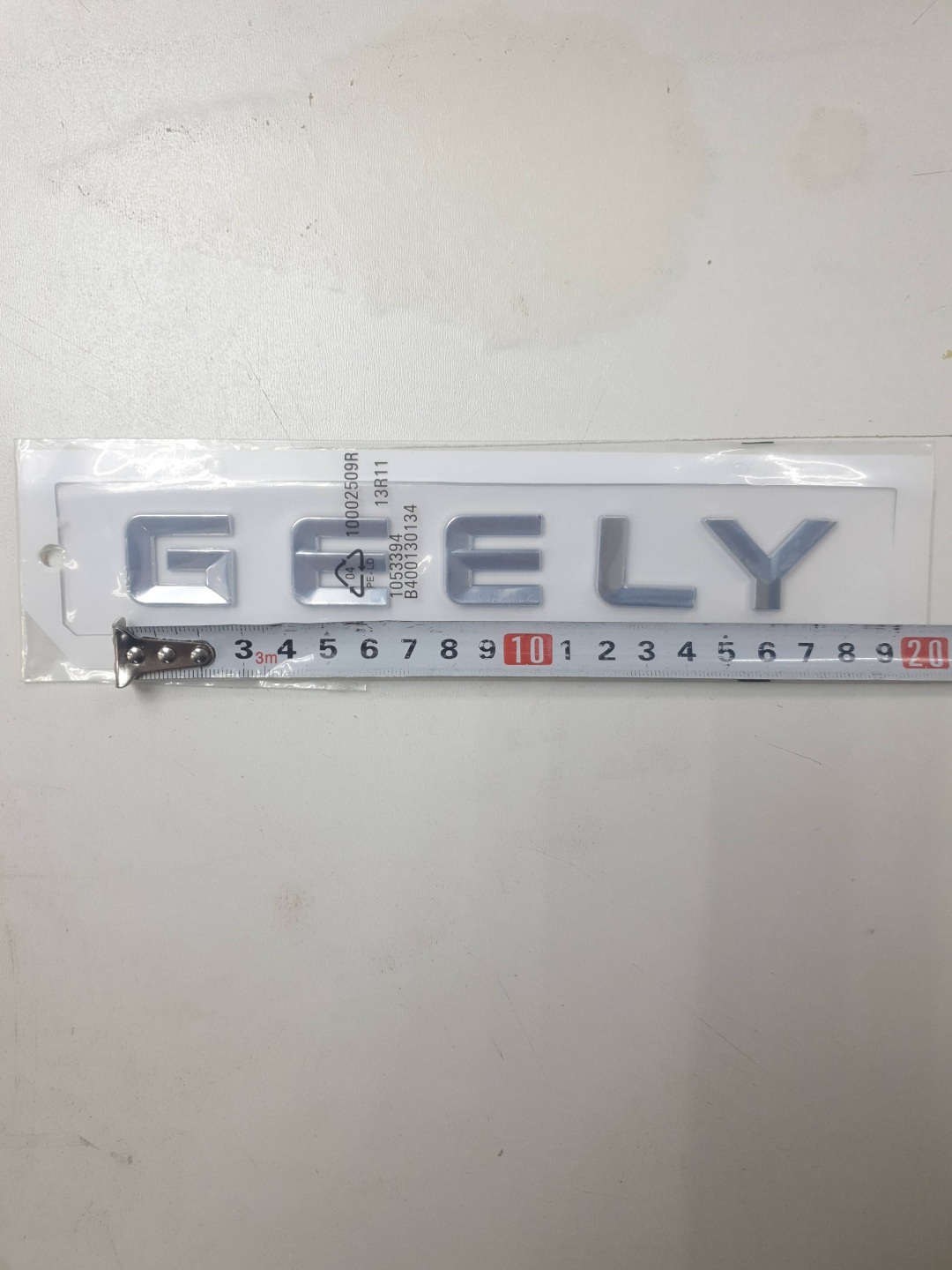 Шильдик 30333872_004670327 Geely Emgrand 7