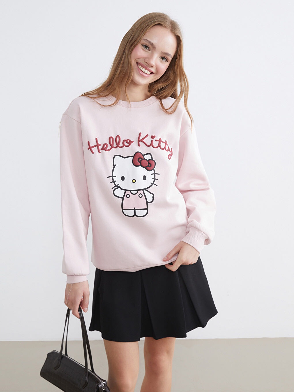 Свитшот Hello Kitty Принт с персонажем Hello Kitty и надписью светло-розовый