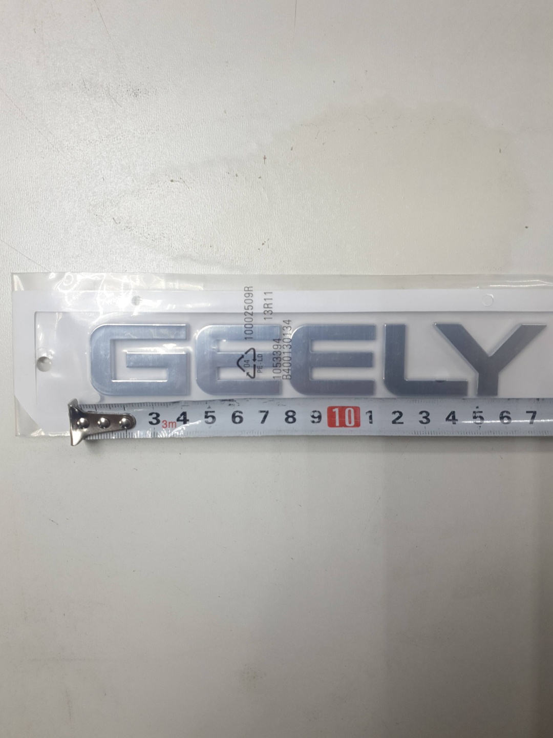 Шильдик 30333872_648265219 Geely Okavango