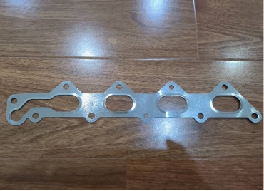 OSSCA Прокладка выпускного коллектора для а/м Chevrolet Aveo, Cruze, Lacetti (66693 / 96378805)