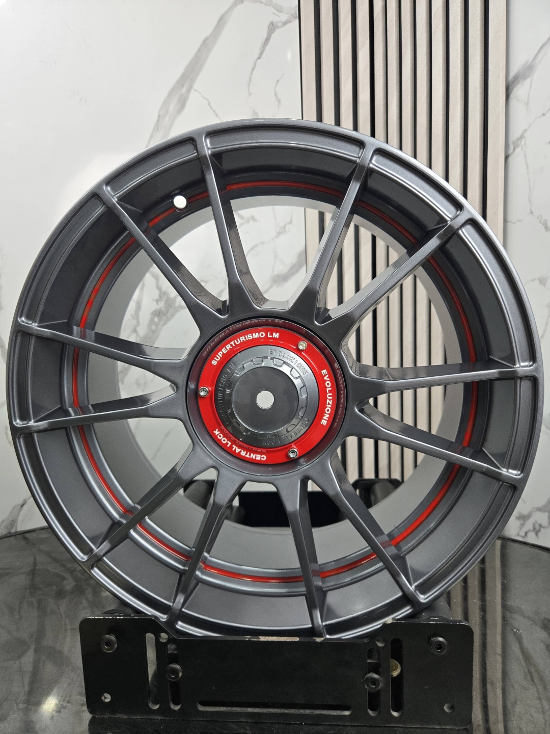 Top Grade EXP6628 7.5x17/4x100 D73.1 ET20 4 диска графит, красный