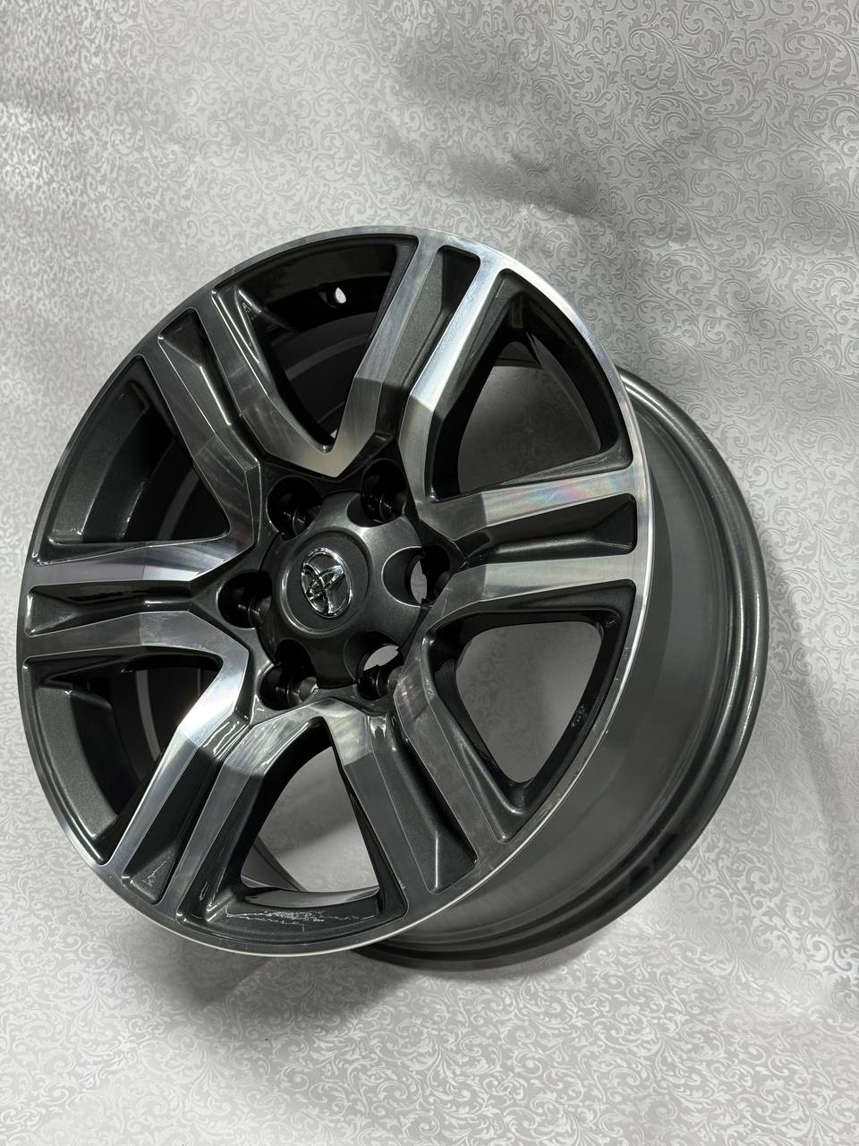 Top Grade Toyota 311-7 7.5x17/6x139.7 D106.1 ET30 4 диска серебристый, графит