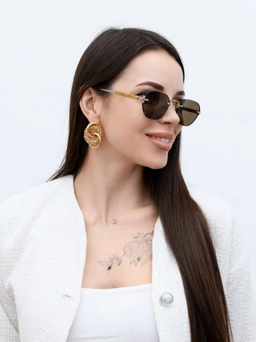 RITA BRADLEY солнцезащитные очки круглые однотонные